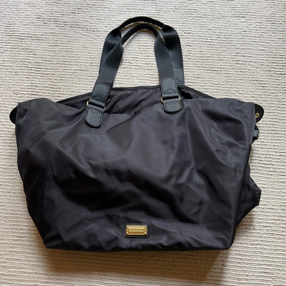 Madden Girl waterproof purse.